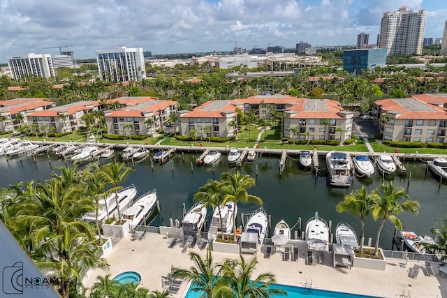 aerial view with a water view and a city view