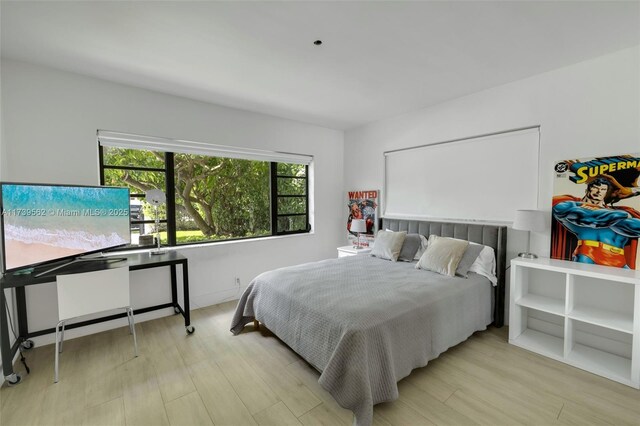 bedroom featuring light wood-type flooring