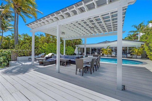 wooden deck featuring a pergola and outdoor lounge area