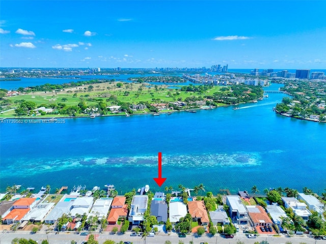 birds eye view of property featuring a water view