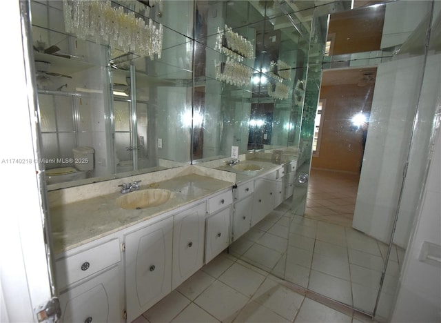 bathroom with tile patterned floors and vanity