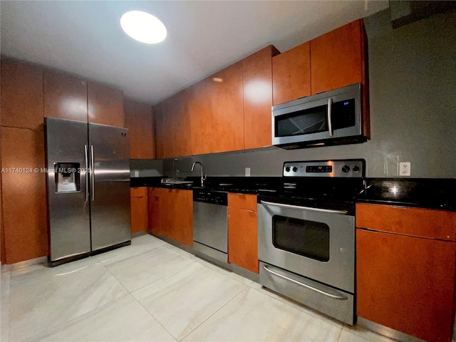 kitchen with stainless steel appliances and sink