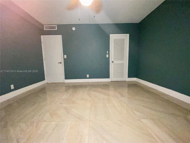 empty room with ceiling fan