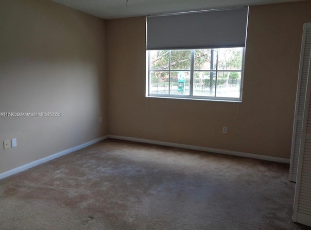 view of carpeted spare room