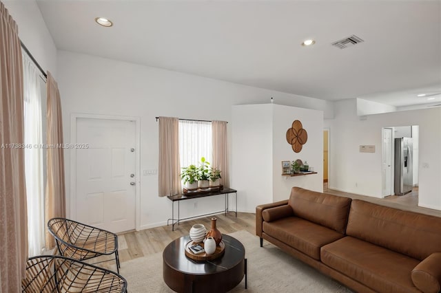 living room featuring light wood-type flooring