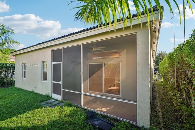 view of home's exterior featuring a yard