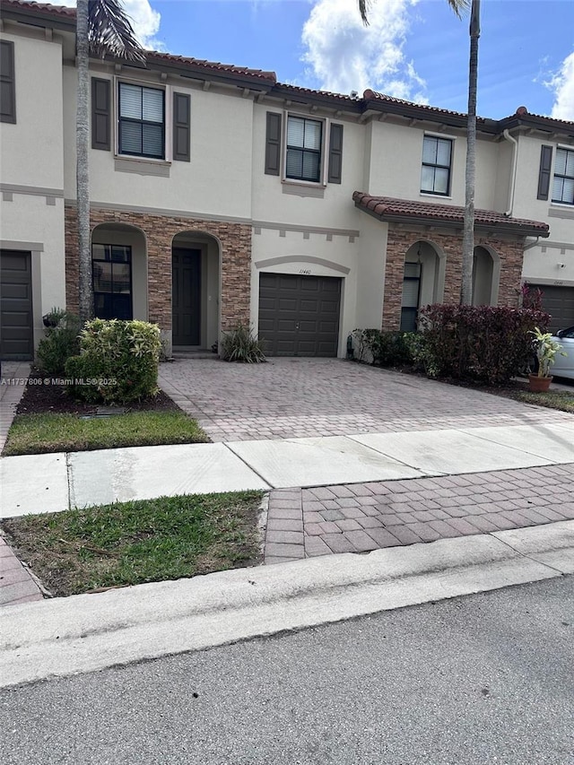 view of front of property featuring a garage