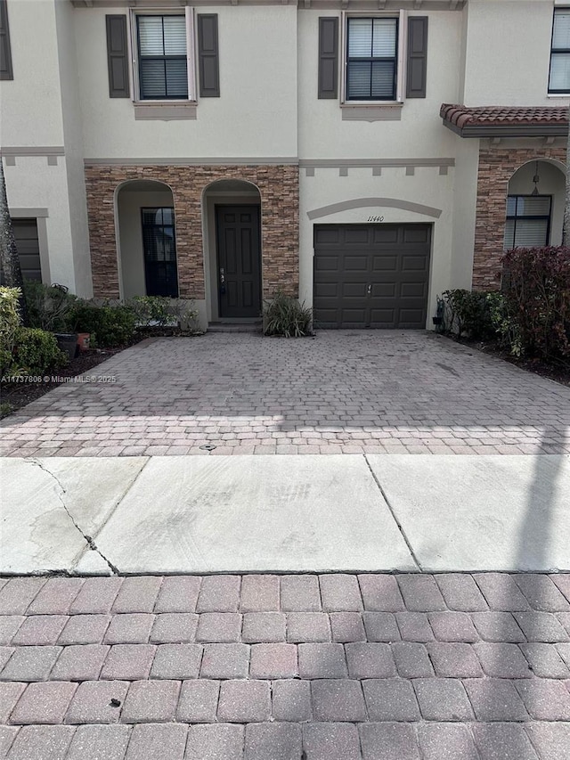 view of front of home with a garage