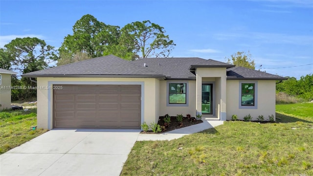 view of front of house featuring a garage and a front lawn