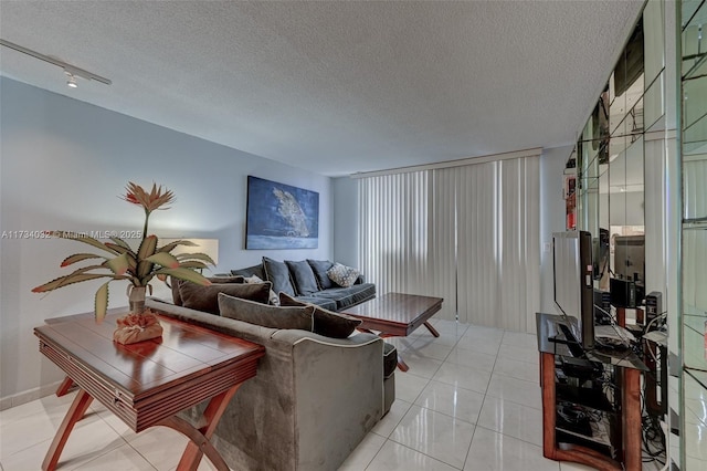 tiled living room with a textured ceiling