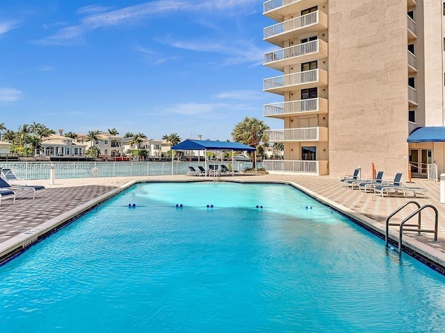 view of pool with a gazebo and a patio