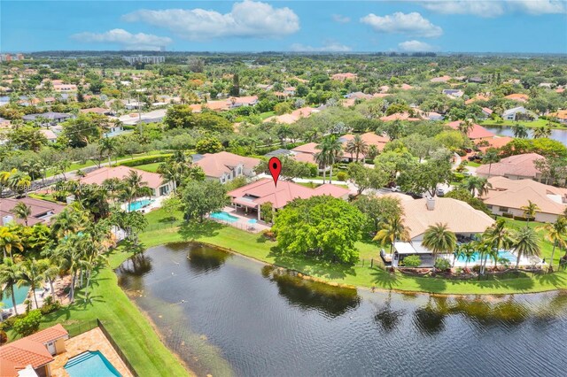 drone / aerial view with a water view