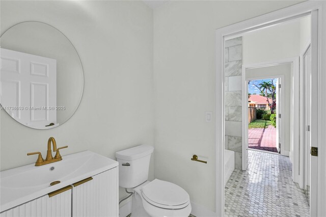 bathroom with vanity and toilet