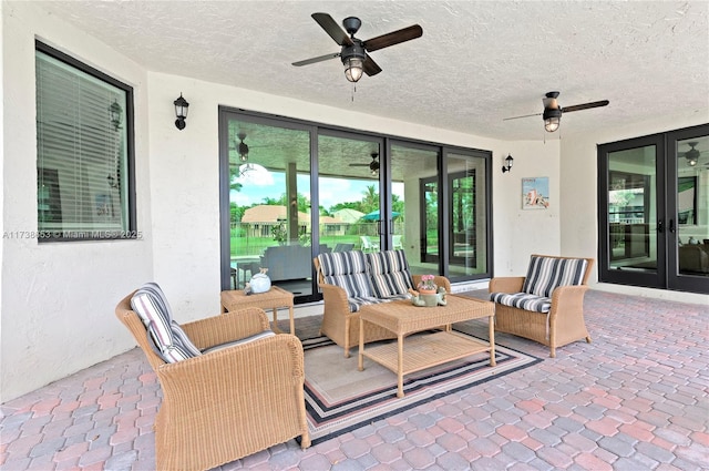 view of patio / terrace featuring ceiling fan and outdoor lounge area