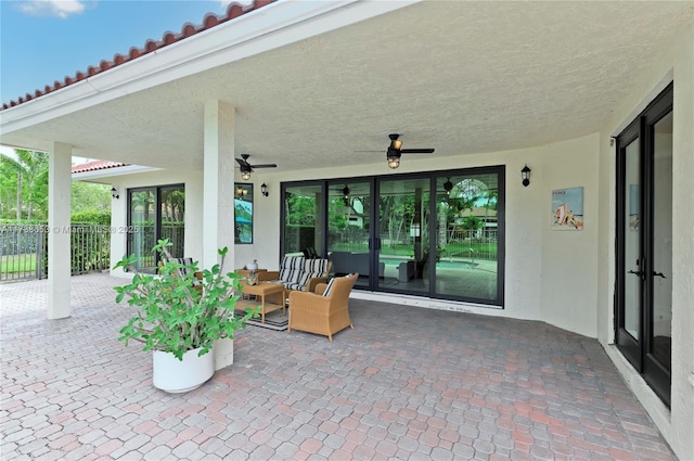 view of patio / terrace featuring ceiling fan