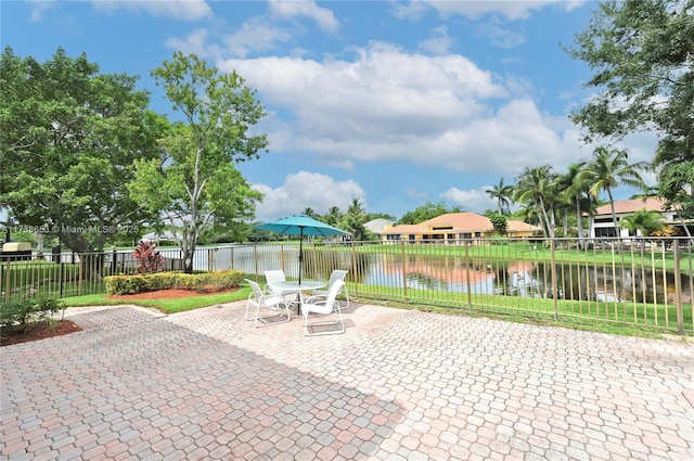 view of patio / terrace with a water view