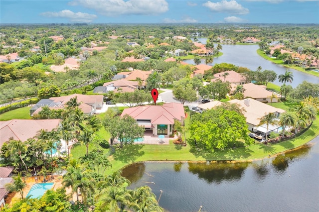 drone / aerial view with a water view