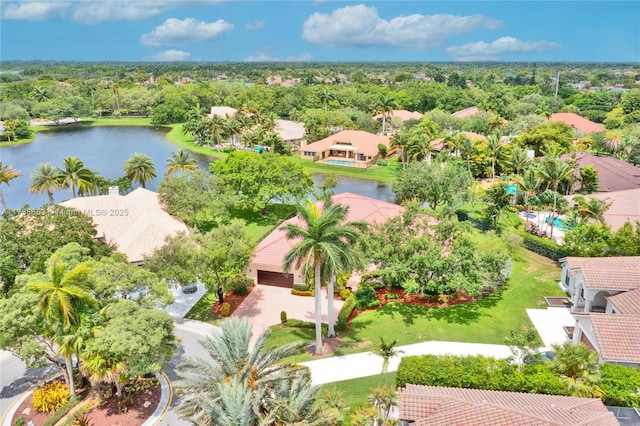 birds eye view of property featuring a water view