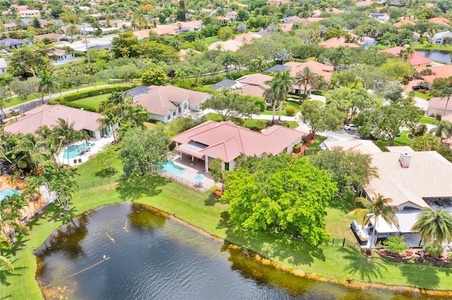 drone / aerial view with a water view