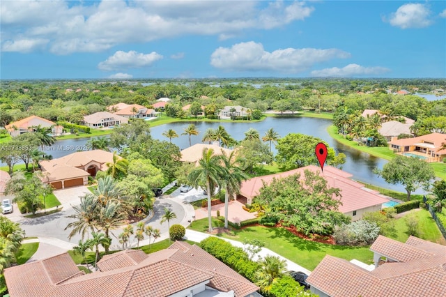 birds eye view of property featuring a water view