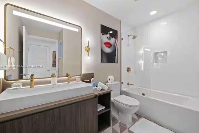 full bathroom with vanity, toilet, and shower / bath combination