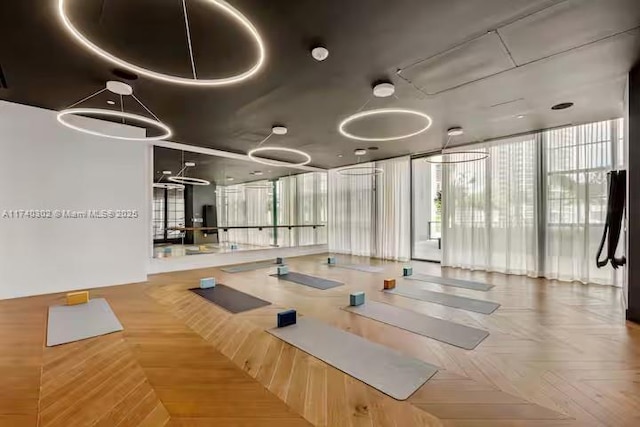 workout area with parquet floors