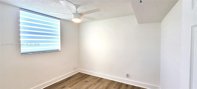 unfurnished room with hardwood / wood-style floors, a textured ceiling, and ceiling fan