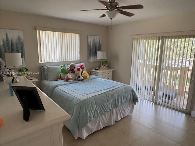 8317 SW 137th Ave Unit 8317, Miami, FL 33183 - bedroom with access to exterior, light tile patterned flooring, and ceiling fan