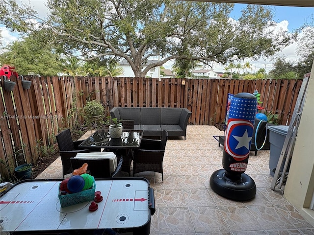 8317 SW 137th Ave Unit 8317, Miami, FL 33183 - fenced backyard with outdoor dining space and a patio