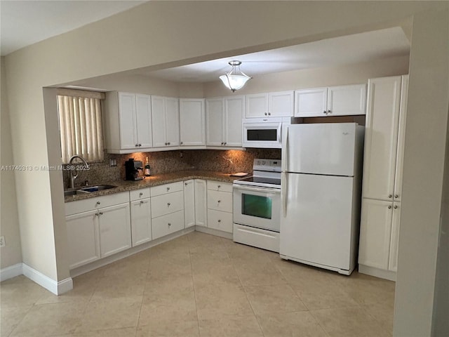 8317 SW 137th Ave Unit 8317, Miami, FL 33183 - kitchen featuring white appliances, decorative backsplash, white cabinetry, and light tile patterned flooring