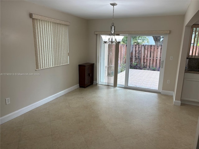 8317 SW 137th Ave Unit 8317, Miami, FL 33183 - unfurnished room featuring healthy amount of natural light and a chandelier