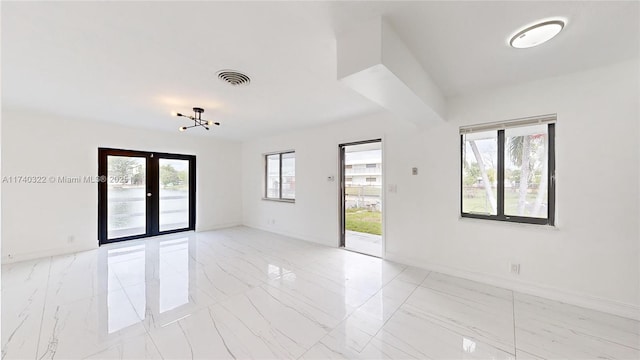 spare room with french doors