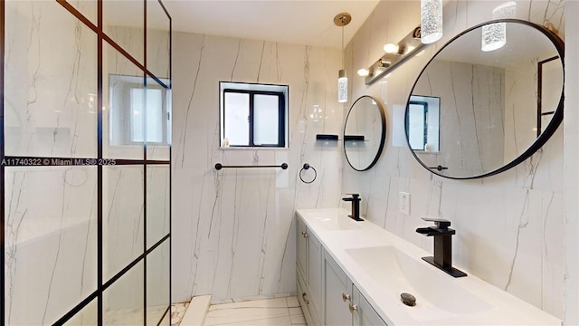 bathroom featuring vanity, tile walls, and backsplash