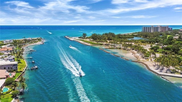 bird's eye view featuring a water view and a view of the beach