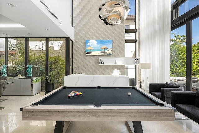 1823 SW 2nd Ct, Miami, FL 33129 - rec room with billiards table and a wall of windows