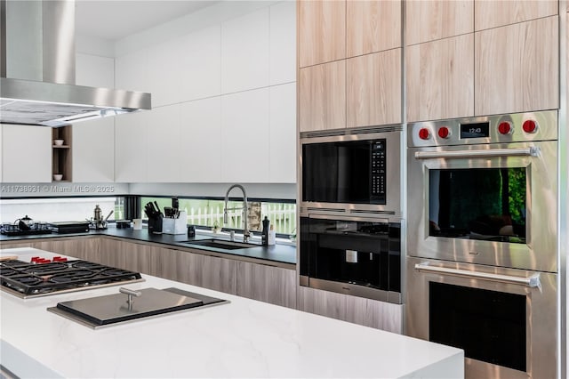 1823 SW 2nd Ct, Miami, FL 33129 - kitchen featuring wall chimney range hood, modern cabinets, and appliances with stainless steel finishes