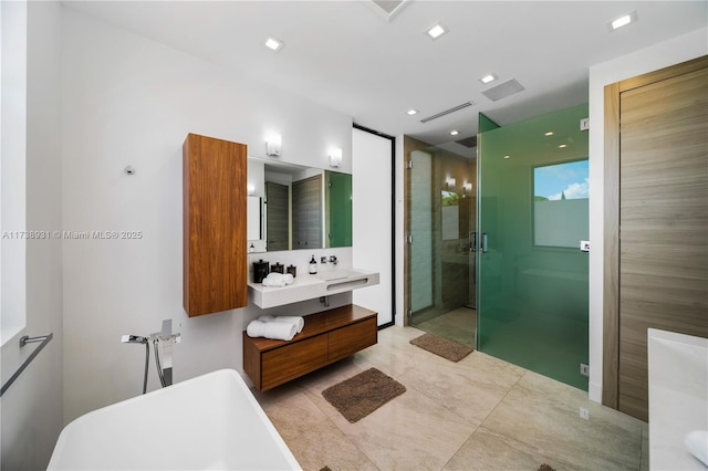 full bathroom with a soaking tub, a shower stall, and double vanity