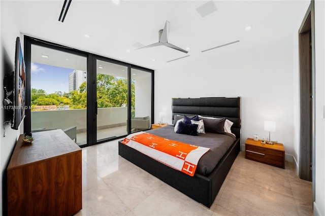 bedroom featuring a wall of windows, access to outside, and visible vents