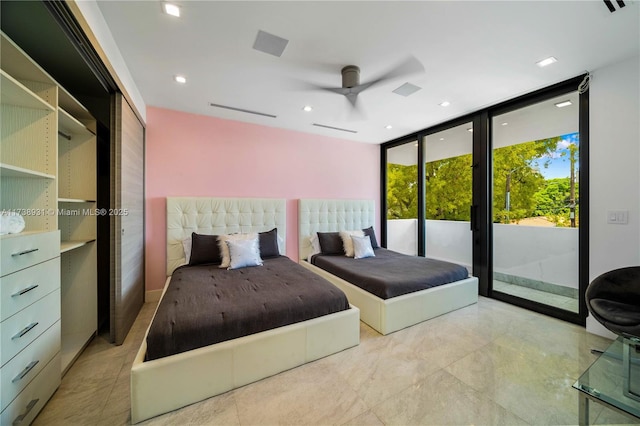 bedroom with expansive windows, recessed lighting, a ceiling fan, and access to exterior