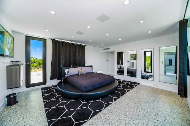 bedroom with recessed lighting, visible vents, access to outside, baseboards, and speckled floor