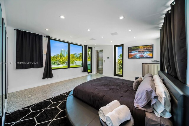 bedroom with expansive windows