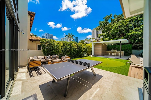 1823 SW 2nd Ct, Miami, FL 33129 - view of patio / terrace featuring outdoor lounge area, a view of city, and a putting area