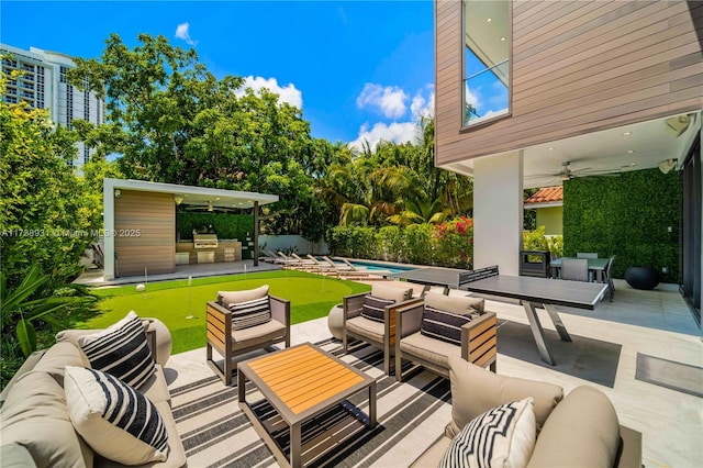 1823 SW 2nd Ct, Miami, FL 33129 - view of patio featuring an area to practice putting, outdoor lounge area, and ceiling fan