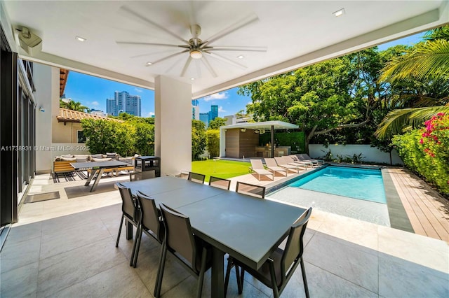 1823 SW 2nd Ct, Miami, FL 33129 - view of swimming pool featuring outdoor dining area, a patio, ceiling fan, and a city view