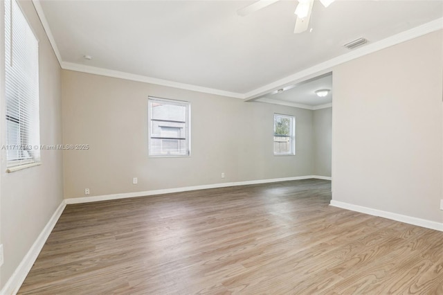 unfurnished room featuring ornamental molding, ceiling fan, and light hardwood / wood-style floors