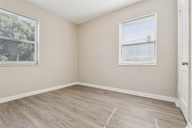 empty room featuring light hardwood / wood-style floors