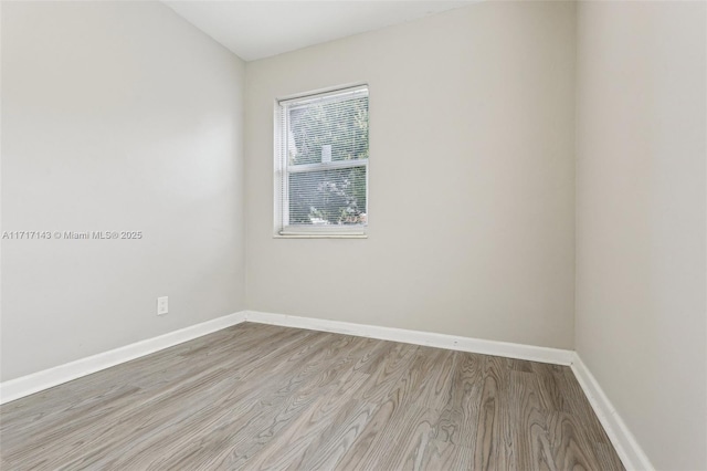 unfurnished room featuring light wood-type flooring