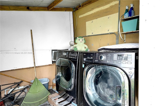 laundry area featuring washer and clothes dryer