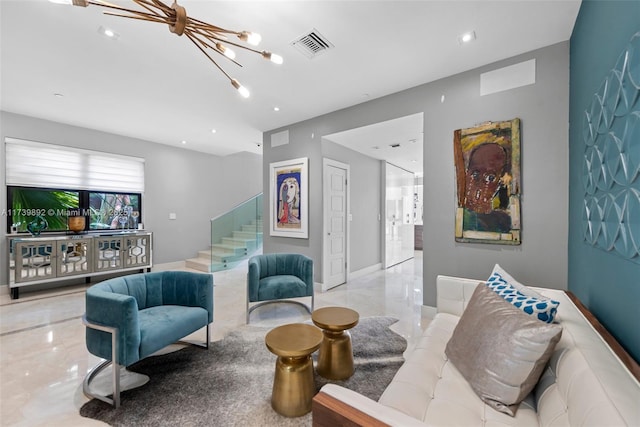 living room with an inviting chandelier