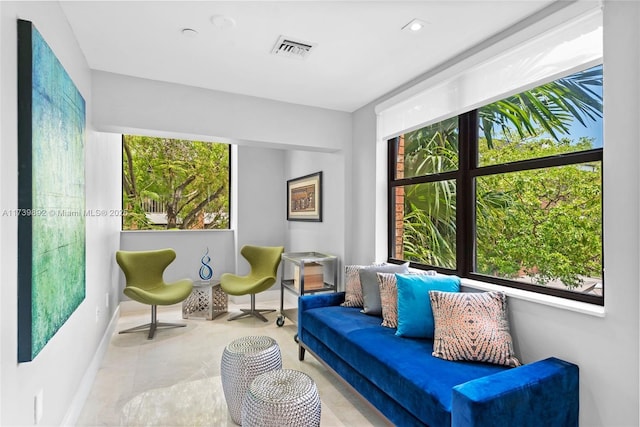 living area with light tile patterned floors